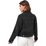 Black denim jacket with button front and flap pockets