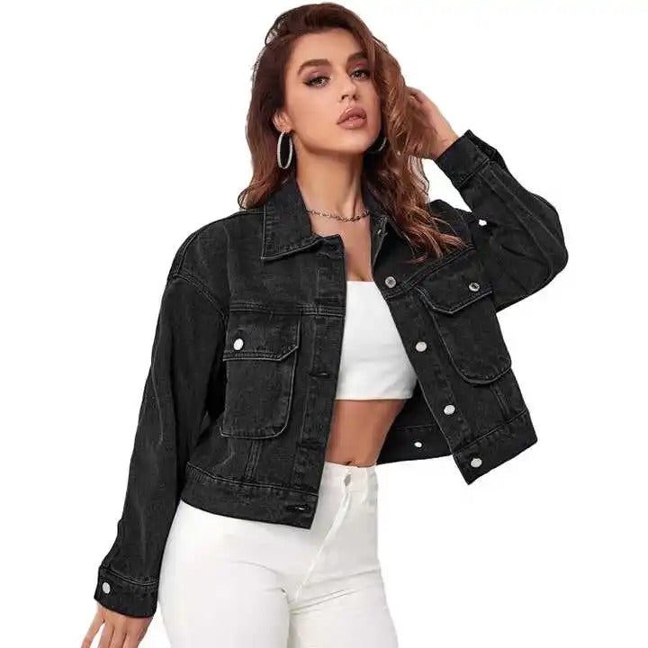 Black denim jacket with button front and flap pockets