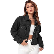 Black denim jacket with button front and flap pockets