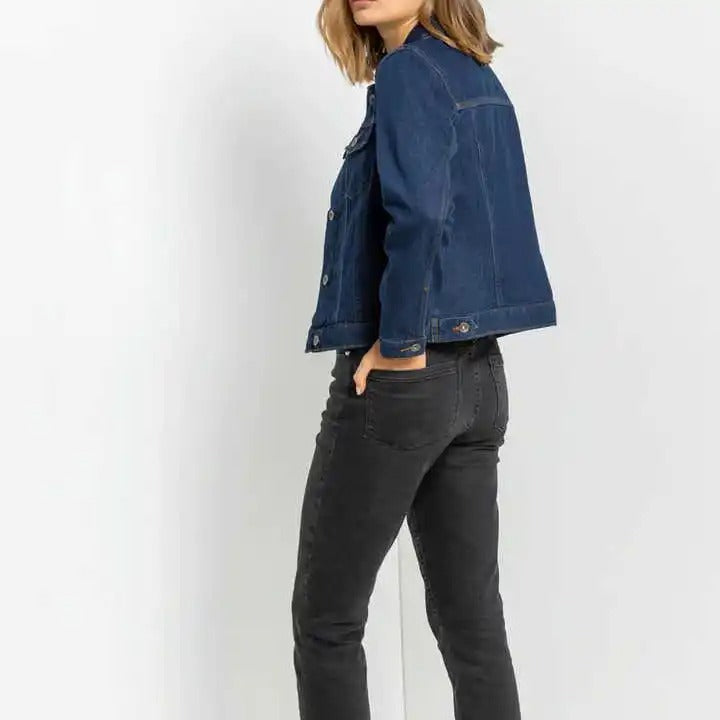 Dark blue denim jacket with button front and chest pockets