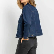 Dark blue denim jacket with button front and chest pockets