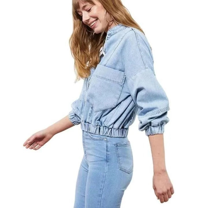 Light blue cropped denim jacket with zip front and patch pockets