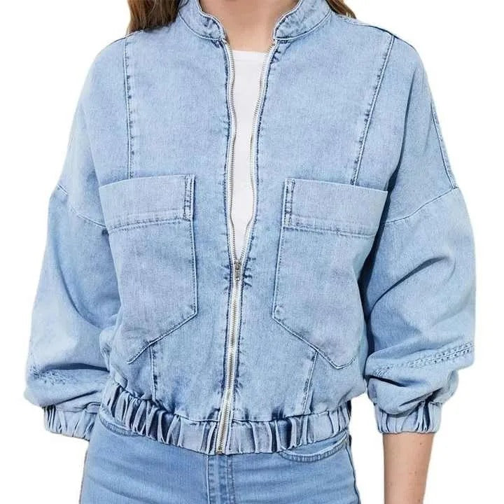 Light blue cropped denim jacket with zip front and patch pockets