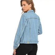 Light blue denim jacket with button front and flap pockets