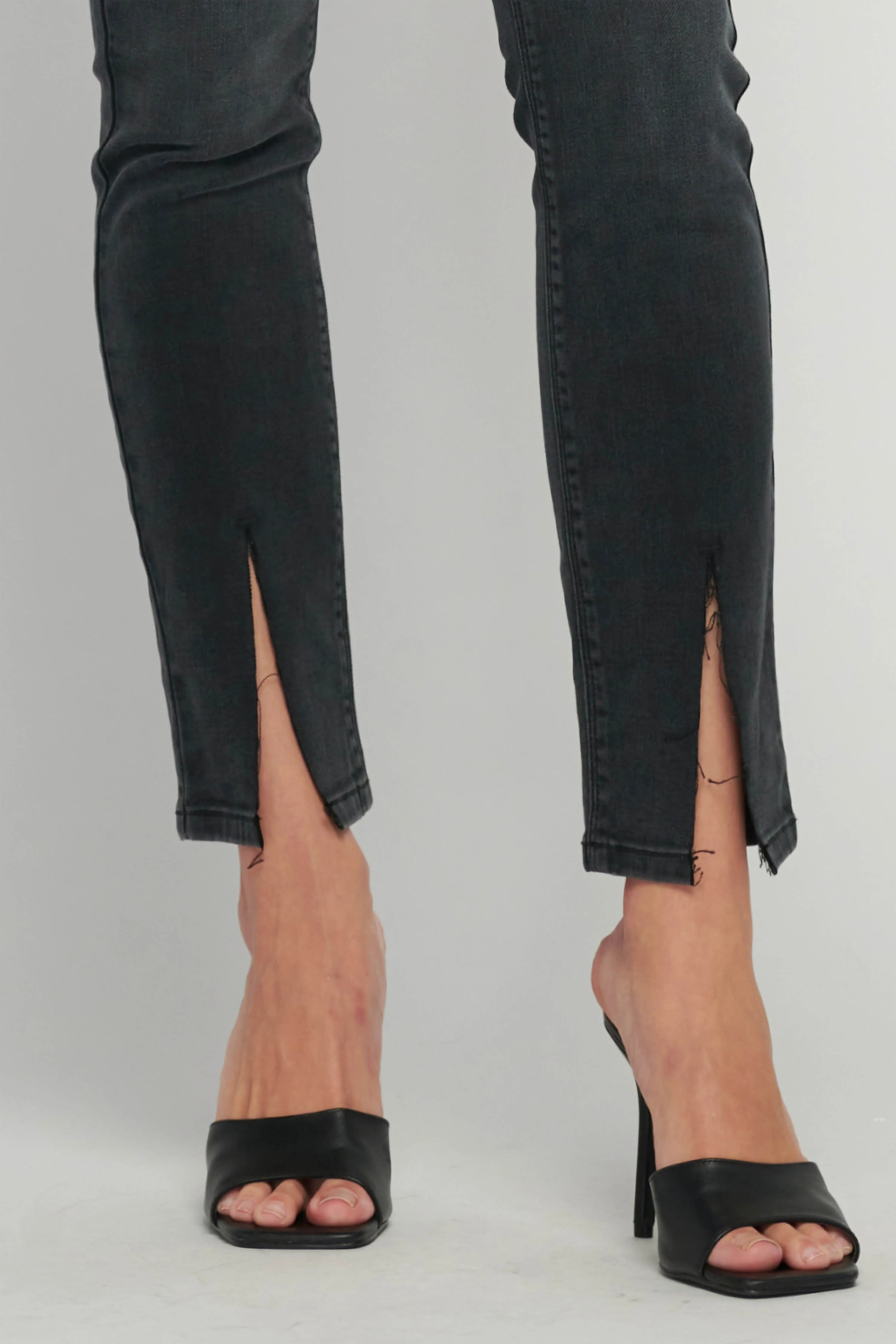 Washed Black High-Rise Skinny Jeans with Front Slit Hem